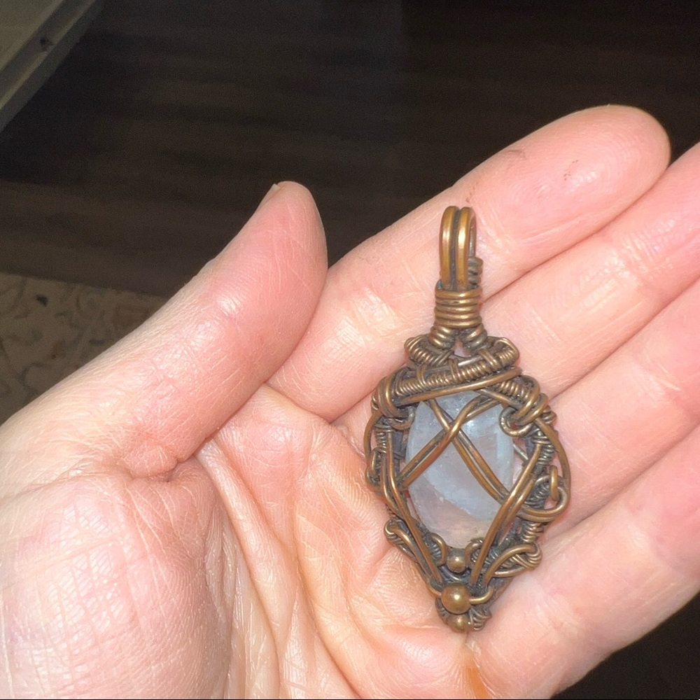Wire wrapped moon stone pendant made by ZD artisan
